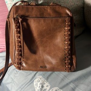 The Sak brown cross over bag that can also be carried as a book bag purse
